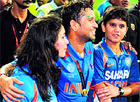With his children Sara and Arjun