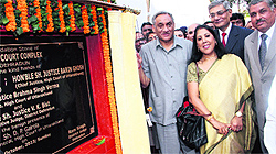Uttarakhand Chief Minister Vijay Bahugun lays the foundation stone of a court complex in Dehradun on Sunday