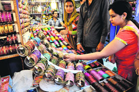 Karva chauth tomorrow: Shoppers flock to markets ahead of Karva Chauth at Patel Bazaar in Jammu on Sunday. 