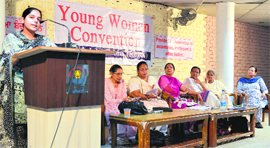 A girl speaks during the Young Women Convention at Punjabi Bhawan in Ludhiana on Sunday. 