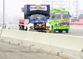 Despite ban, heavy vehicles plying with impunity on the elevated road in Amritsar on Monday