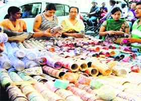 Preparing for fast: Women select bangles on the eve of Karva Chauth in Amritsar on Monday