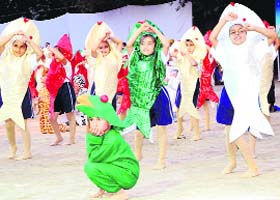 Students perform a dance in Amritsar on Monday
