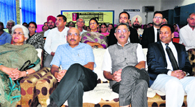 Justice Hemant Gupta and Justice Ajay Tewari (second and third from left, respectively) of the Punjab and Haryana High Court at Government High School, Sector 26, Chandigarh, on Monday.