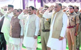 IN REMEMBRANCE: Chief Minister Vijay Bahuguna, along with his Cabinet colleagues and senior state police officials, pay homage to martyrs on the Police Commemoration Day parade held at the Police Lines in Dehradun on Monday