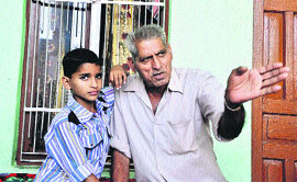 Bishan Dass, whose house was targeted by Pakistan Rangers, in Suchetgarh Kullain village in the Samba sector on Sunday.