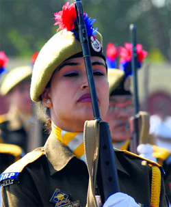 A policewoman at the annual Police Commemoration Day ceremony at Zewan in Srinagar on Monday. Tributes were paid to more than 576 policemen and paramilitary soldiers on the occasion.