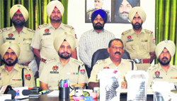 SSP Khanna, Sushil Kumar, along with other police officials brief mediapersons at Khanna on Monday. a tribune photograph