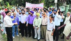 United Forum of Bank Unions hold a protest in Ludhiana on Monday.