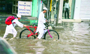 Local streets were flooded after heavy rains in Hyderabad on Monday.