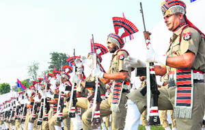 policemen with their arms during the Police Commemoration Day function in Jalandhar on Monday.