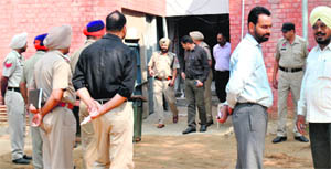 The police inspecting the blast site in Nabha on Monday. 