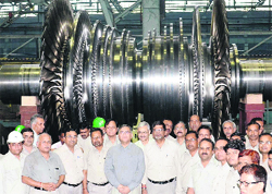 Prakash Chand, Executive Director, flags off the first 800 MW LP Turbine Rotor at the Turbine Manufacturing Block, HEEP Ranipur, in Haridwar.