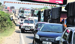 A view of the long traffic jam on the Jammu-Pathankot national highway on Tuesday.