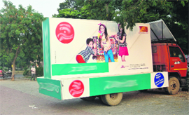 A mobile advertising van stationed near Rajguru Nagar in Ludhiana on Monday.