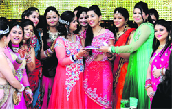 Women celebrate Karva Chauth in Ludhiana on Tuesday. 