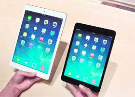 Apple's new iPad Air (L) and iPad Mini tablet are seen in this picture in San Francisco, California on Tuesday