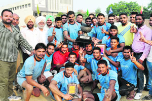 The winning kabaddi team of the Akal College of Physical Education, Mastuana, in a jubilant mood after winning the Punjabi University Kabaddi Championship in Bathinda on Wednesday. 
