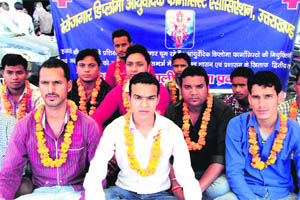 Unemployed Ayurvedic diploma pharmacists on an indefinite fast in support of their demands in Dehradun on Wednesday.