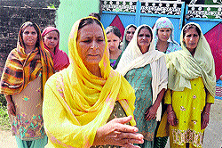 Women of Pindi Charakan Kalan village in the Arnia sub-sector in Jammu region express their anger over Pakistan shelling on Tuesday night