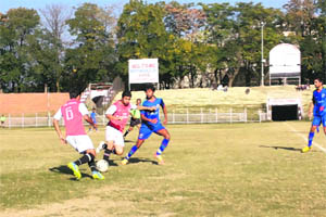 Players in action during a football match in Srinagar on Wednesday. 