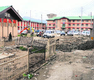 A heap of garbage dumped near SMHS Hospital in Srinagar on Wednesday.