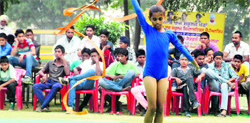 A gymnast in action during the 59th Punjab School Games in Bathinda on Thursday. A Tribune photograph