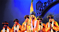 Students of Alexander Memorial School present a cultural item during the annual day function at the Police Auditorium in Jammu on Thursday