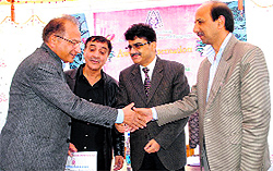 Atal Dulloo, Principal Secretary, Tourism and Culture, gives away awards at the theatre festival in Srinagar on Thursday