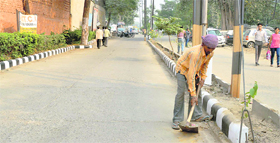 A road being cleaned on the premises of Lord Mahavir Civil Hospital on Thursday.