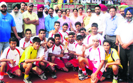 The Sangrur team in a jubilant mood after winning the hockey final during the 59th Punjab State School Sports Tournament on Friday. 