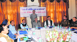 Chief Minister Vijay Bahuguna presides over an internal security workshop in Dehradun on Friday. A Tribune photograph