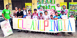 Volunteers of Waste Warriors during a cleaning campaign in the Jakhan area of Dehradun on Friday