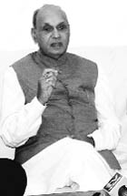 Leader of Opposition Prem Kumar Dhumal addresses a press conference at Nurpur on Friday. 