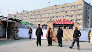 Police personnel in front of the civil secretariat in Srinagar on Friday.