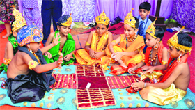 Students play chausar during an exhibition at Atam Devki Niketan in Ludhiana on Friday.