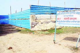 The construction company building a jail complex blocks the way to a satellite hospital in Amritsar on Saturday
