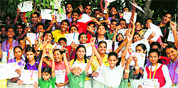 Students in a jubilant mood after receiving prizes at the annual athletics meet held at Model Tribune School in Chandigarh on Saturday