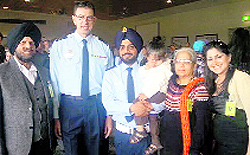 Inderjeet Singh Sodhi with his family members after the initiation ceremony in Australia
