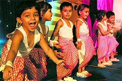 Students of Small Wonders School perform a dance item during in Mohali on Saturday