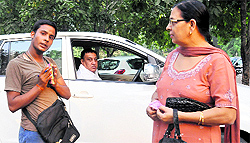 An employee at the RLA parking lot in Sector 17, Chandigarh, apologises to a visitor on Saturday