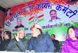 Chief Minister Virbhadra Singh with Health Minister Kaul Singh during the Mandi Parliamentary constituency meeting at the Congress Bhawan in Shimla on Saturday. MP Pratibha Singh looks on.
