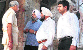 Advocate Navtej Singh Toor trying to locate the house of former Pakistani president Wasim Sajjads house.