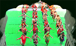 Girls present a cultural item during a function in Jammu on Saturday