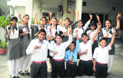 The victorious students in a jubilant mood. A Tribune photograph
