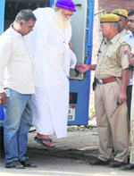 Asaram Bapu, an accused in a sexual assault case, comes out of the Sessions Court in Jodhpur on Saturday. PTI