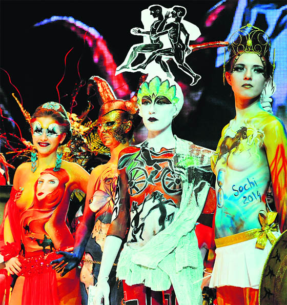 A body-painted model displays a creation ‘Olympic Games’ by painter Ksenia Eliseyeva during an art show as part of the International Beauty Expo ‘Nevskie Berega’ (Neva River Banks) in Saint-Petersburg.