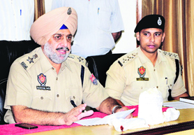 SSP (Rural) Manmohan Singh during a press conference in Amritsar on Sunday. 