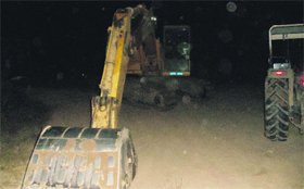 Sand being excavated illegally from a seasonal rivulet near Banda Singh Bahadur War Memorial.