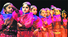 Students enact a scene from the play Beauty and the Beast at Tagore Theatre in Chandigarh on Sunday.